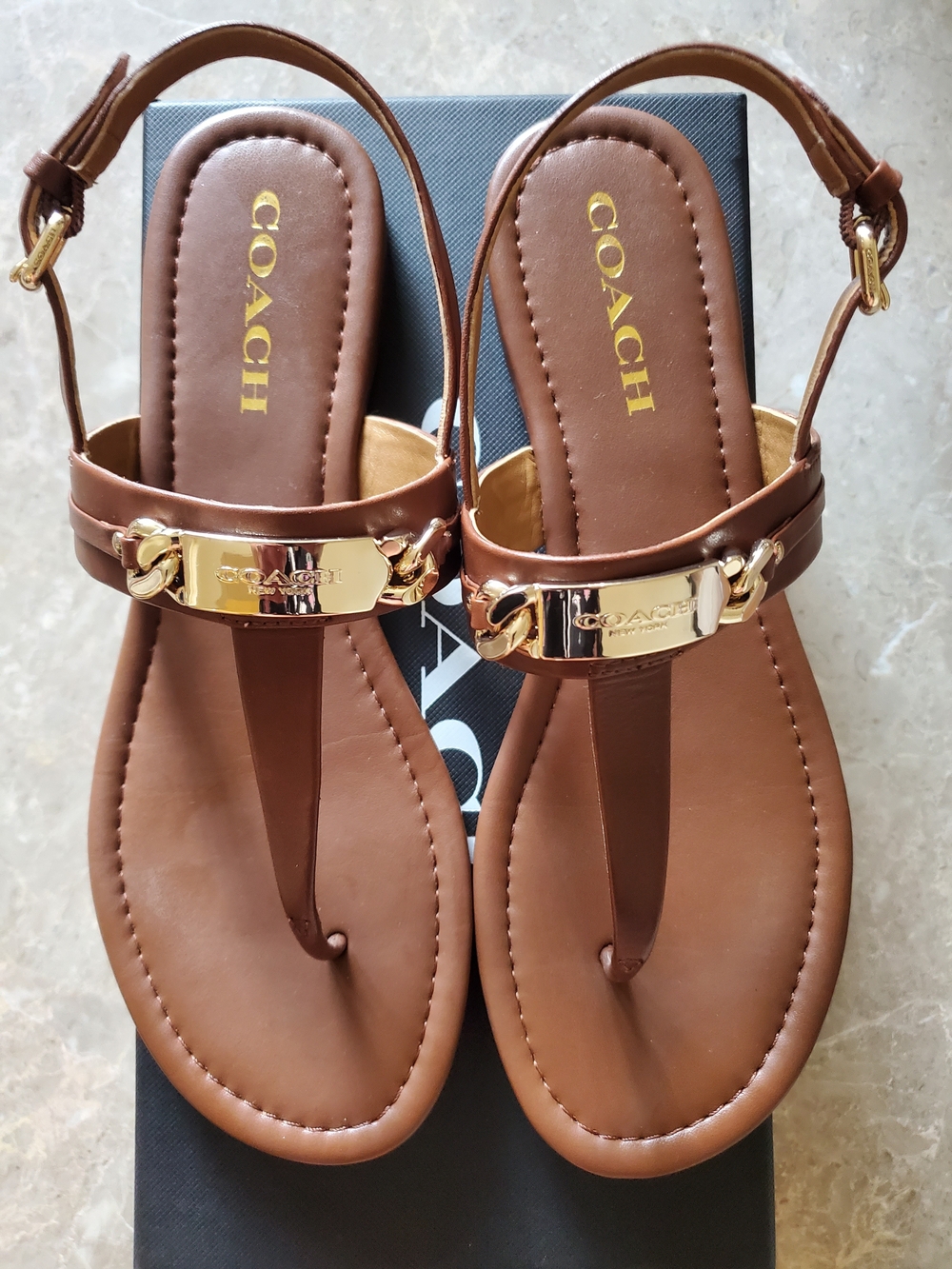 COACH Brown Leather T-Strap Sandals with Gold Accent